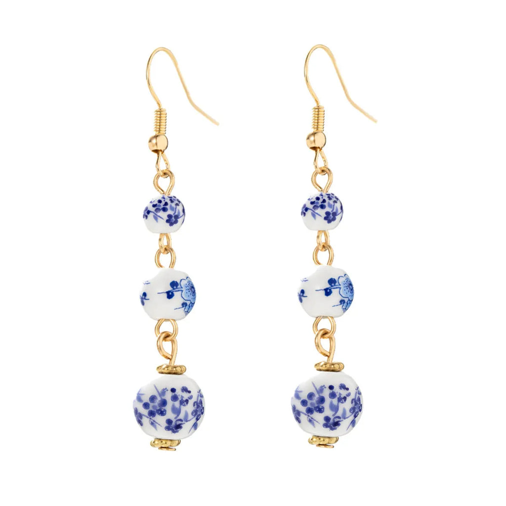 Blue and white porcelain ceramic bead retro earrings with geometric alloy electroplated construction
