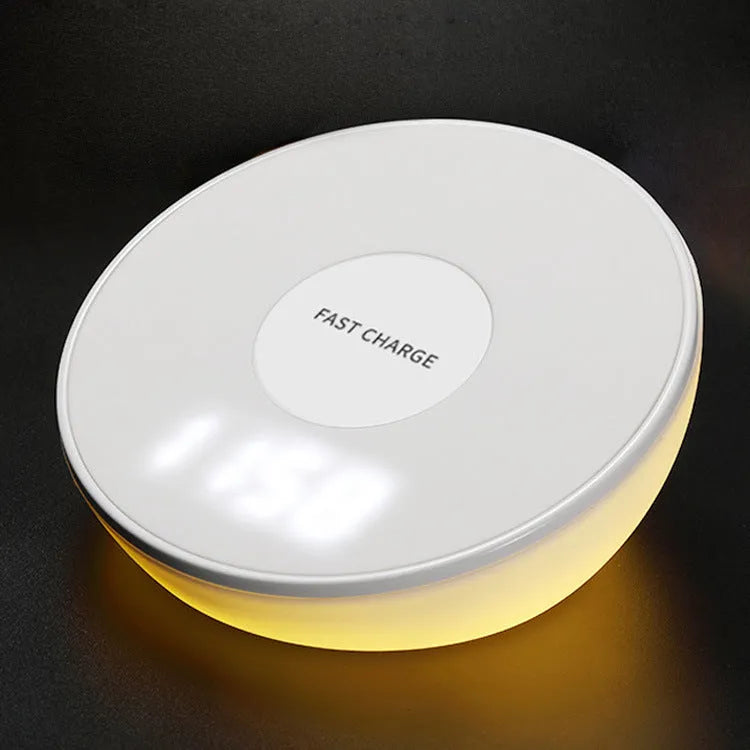 White wireless charging pad with clock display and alarm functions for smartphone bedside charging