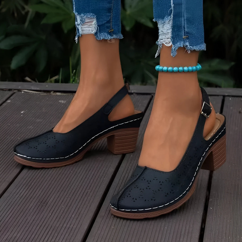 Women's black closed toe wedge sandals with round toe and rubber sole