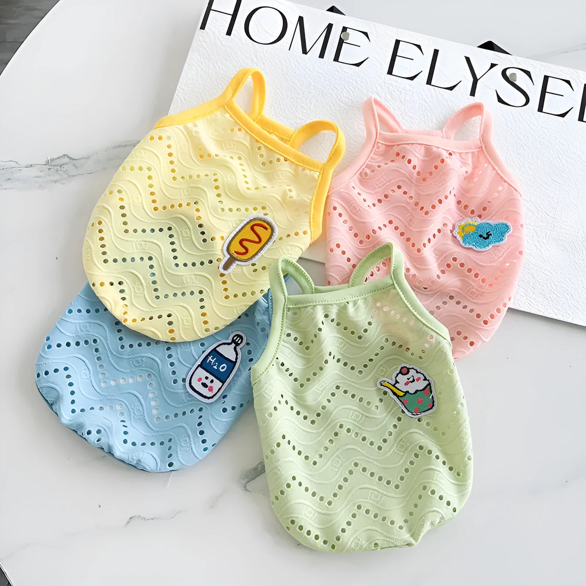 Blue mesh breathable strap pet vest for a dog, showing camisole design.