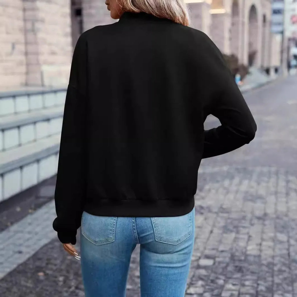 Women's solid black casual zip jacket with faux pockets and long sleeves