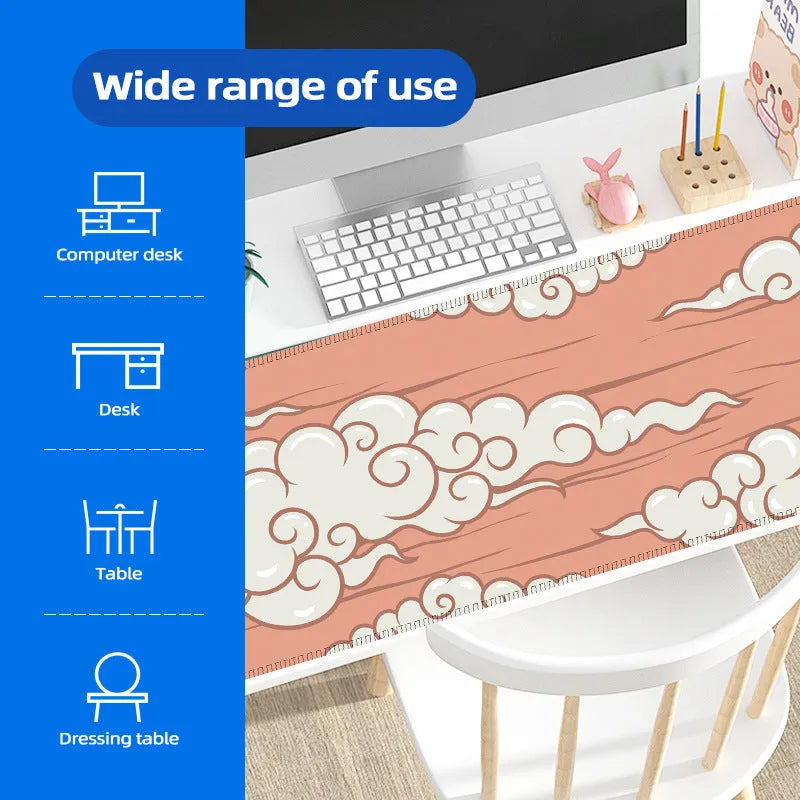 Large Japanese-style cloud pattern desk mat on a wooden office desk with keyboard and mouse.