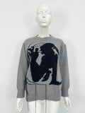 Women's grey alpaca wool sweater with tassel detailing and abstract pattern