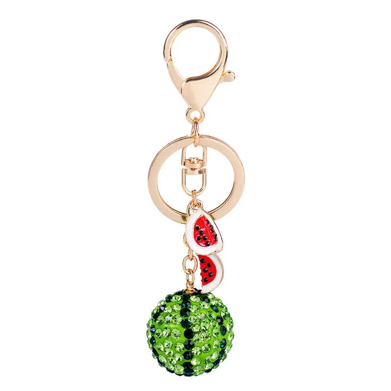 Green watermelon shaped zinc alloy keychain measuring 12cm in length