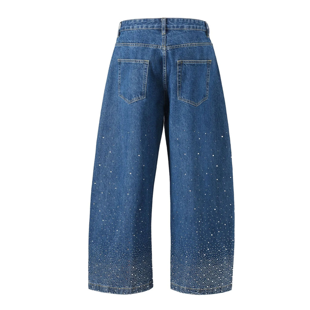 Blue loose-fitting wide-leg cotton trousers on hanger showing pullover style and streetwear design