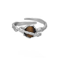 Women's adjustable Saturn ring in silver with white gold electroplated finish and open design