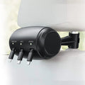 Black car headrest charger with 3-in-1 Micro USB, USB-C and Lightning ports and 1.5m auto-shrinking cable.