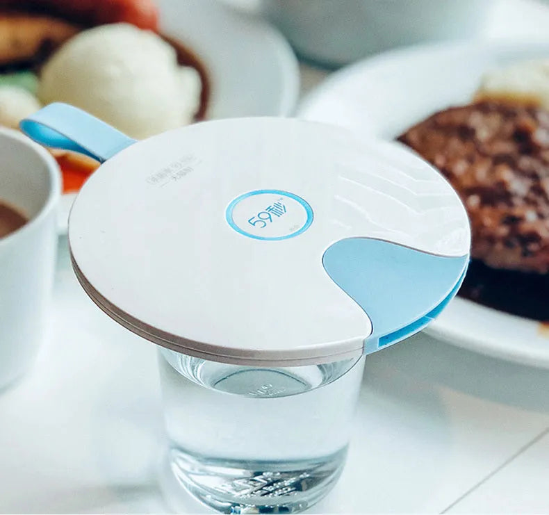 Blue portable baby bottle steriliser with USB cable, showing compact slim design.