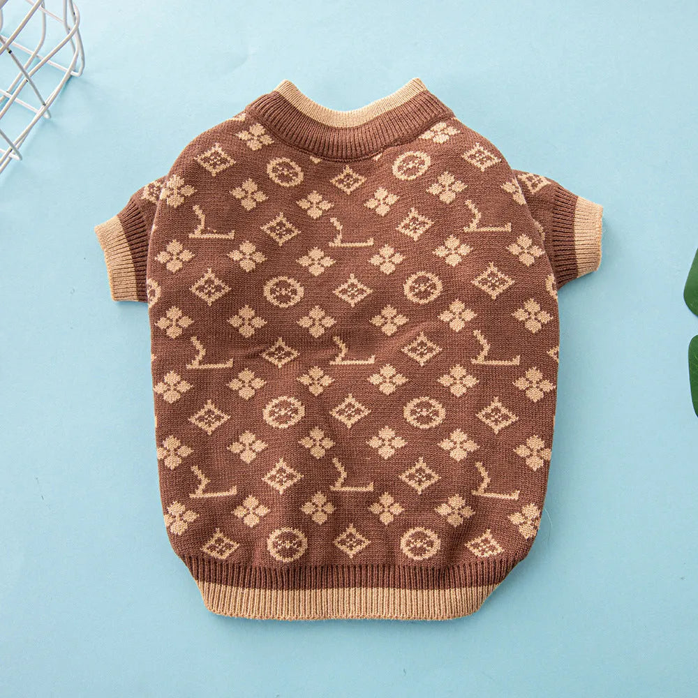 A thick wool dog sweater shown in a monochrome colour, sized for a medium dog.