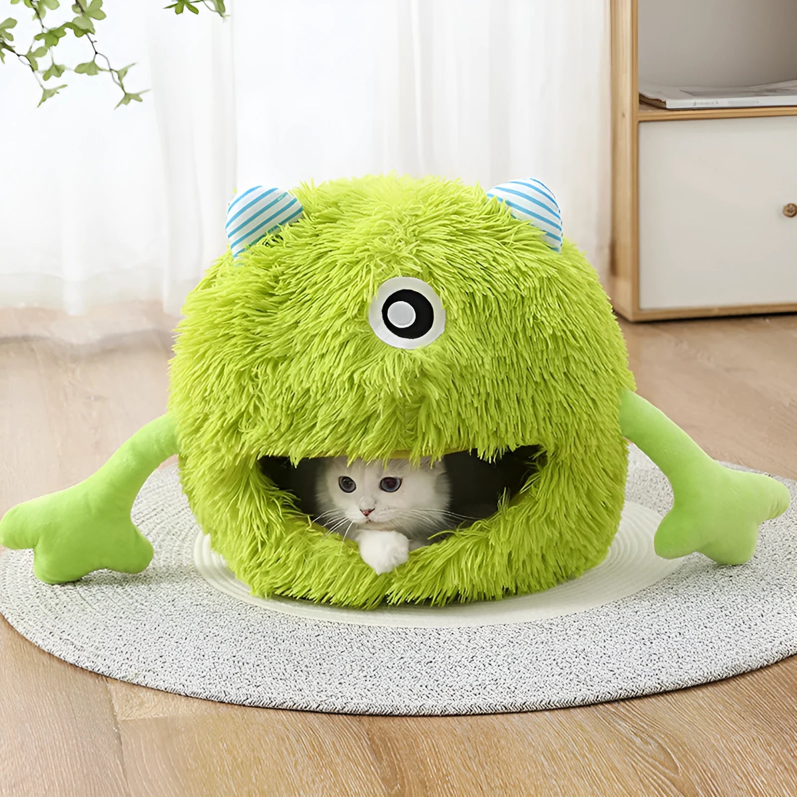 Round plush cat bed with non-slip base shown in three measured sizes for indoor pets