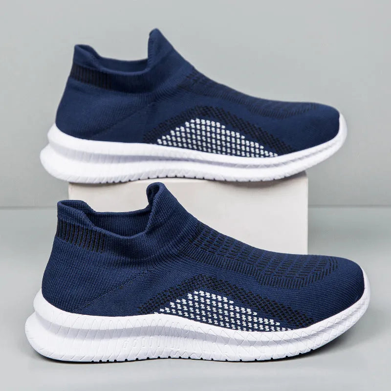 Popcorn Flyknit low-top fabric sneaker in solid colour with round toe and flat sole