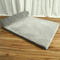 Corduroy pet sofa dog bed with bolster in grey colour, showing non-slip base and high-density sponge padding