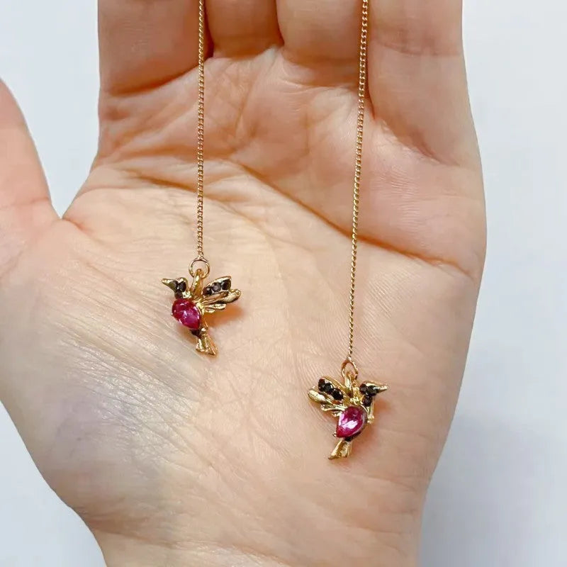 Long style bird hanging earrings with mixed zirconium wings in alloy electroplated construction