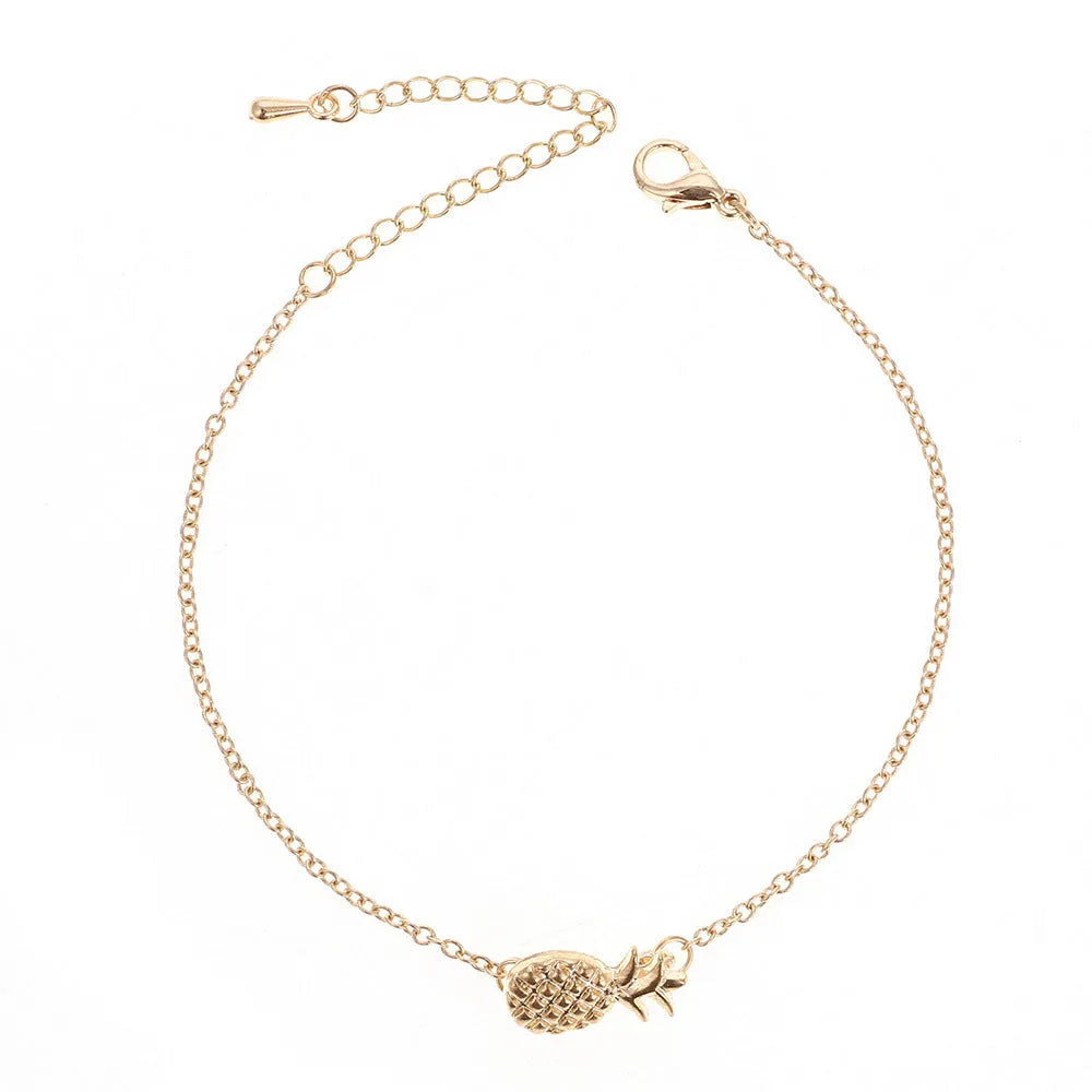 Women's alloy bracelet with pineapple fruit charm in gold or silver tone simple jewellery design