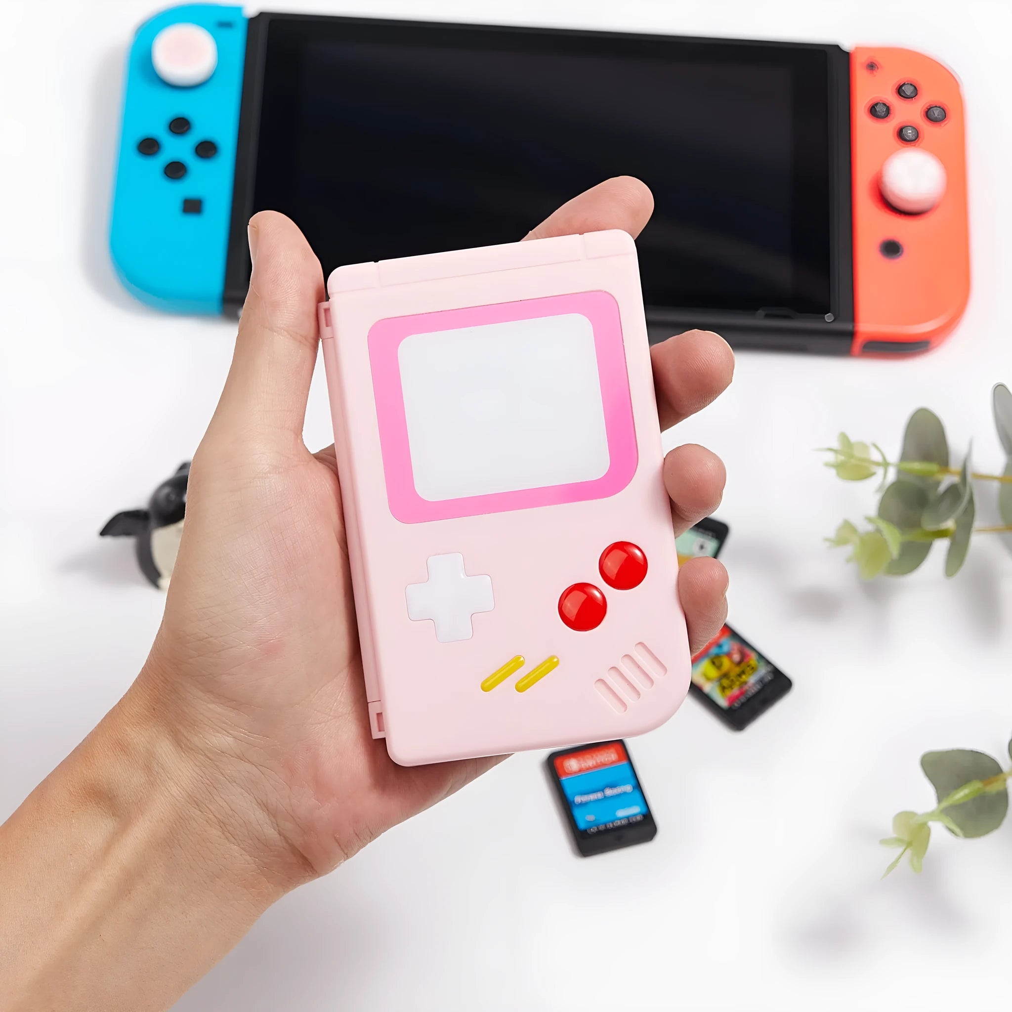 Nintendo Switch game card storage box in white, pink and blue colours