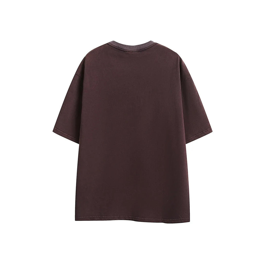 Purple and black loose-fit cotton t-shirt with retro half-sleeve design on hanger