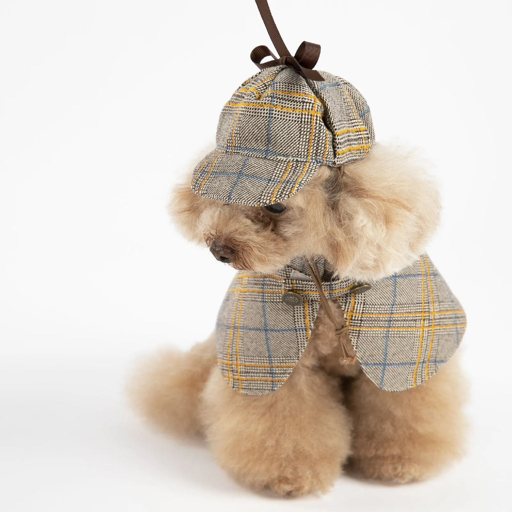 Camel-coloured cotton detective cloak costume for a dog, featuring an adjustable hat.