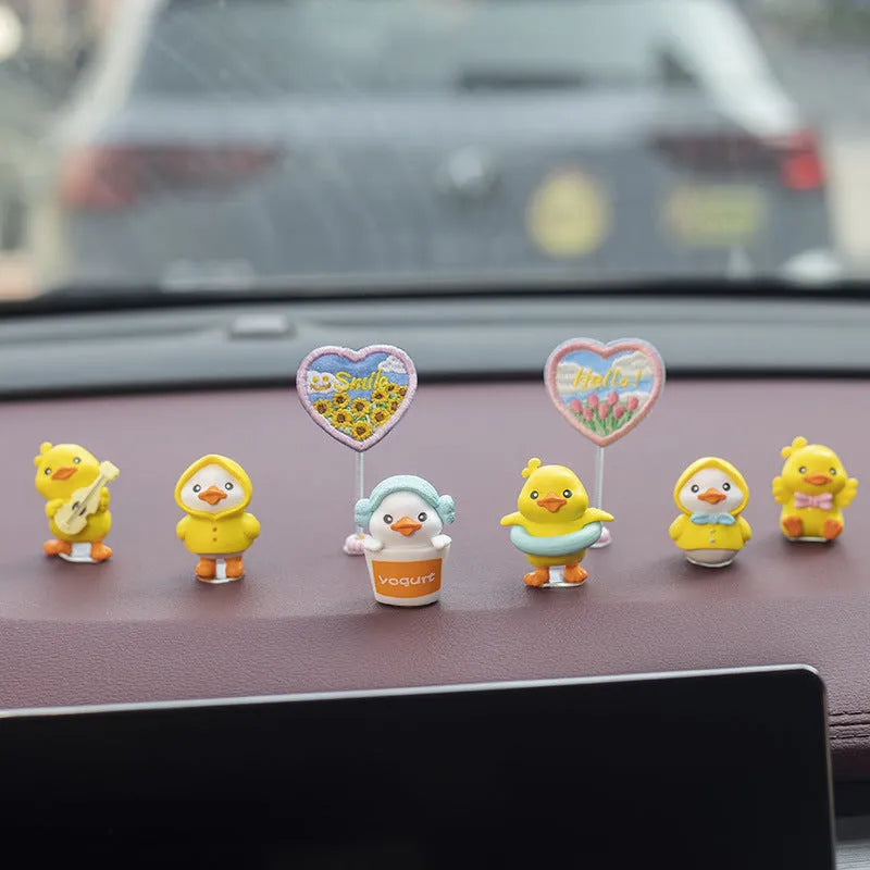 PVC cartoon duckling car dashboard decoration set with six small ducks and road sign label