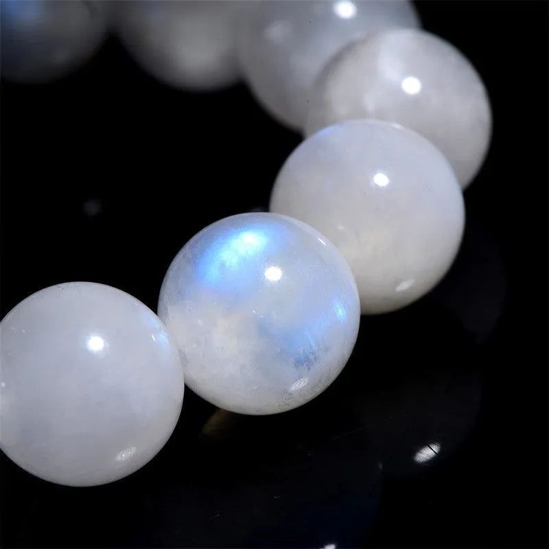White moonstone bracelet with blue moonlight colouration in round polished beads