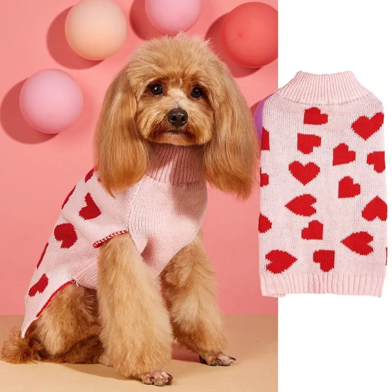 Red dog sweater with a white love heart pattern on the back, sized for a small dog.