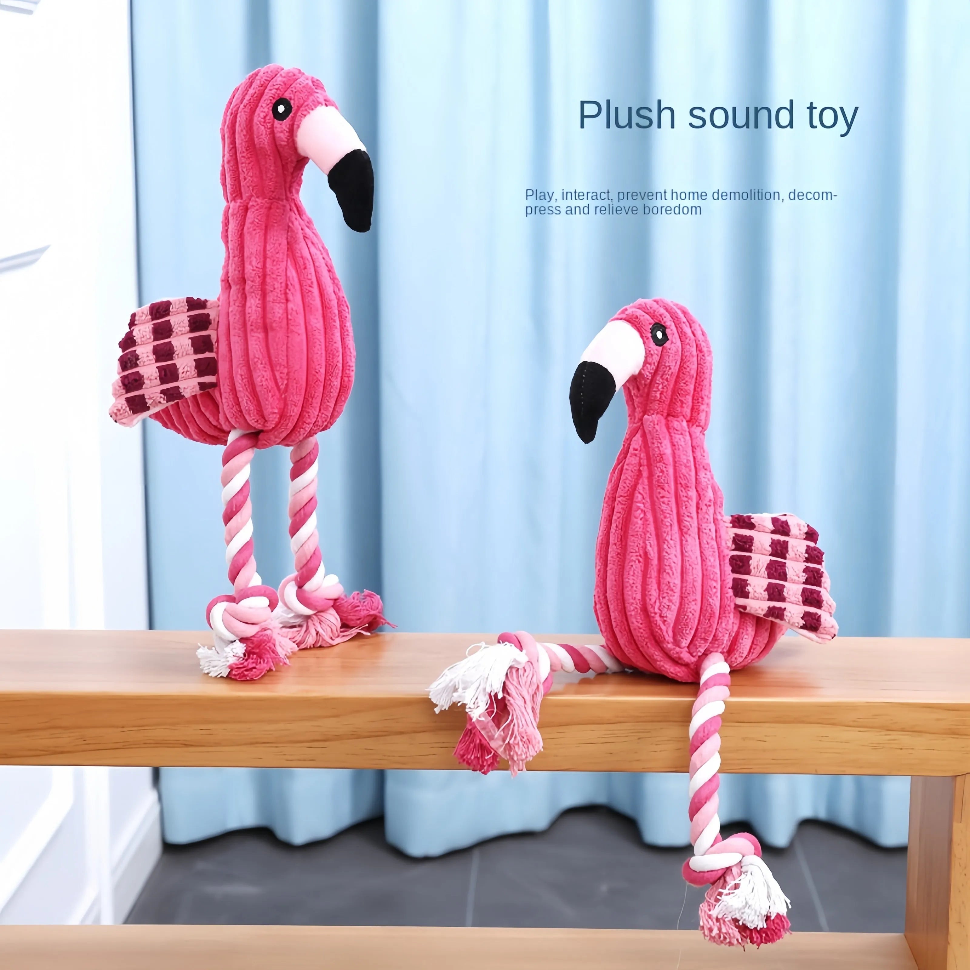 Pink animal-shaped plush dog toy with corduroy material and squeaker inside