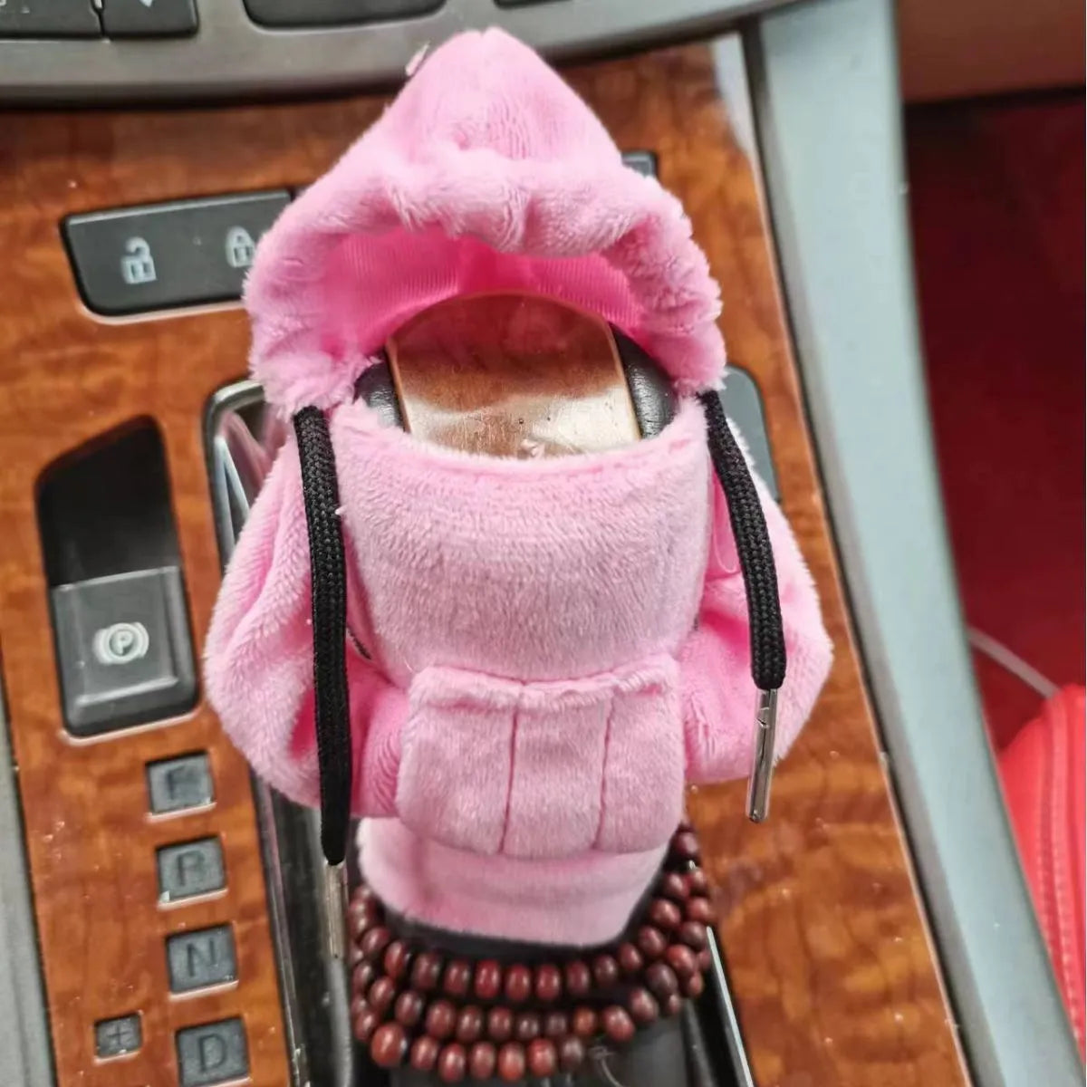 Dutch velvet car gear handle sleeve in multiple colours covering a manual handbrake lever.