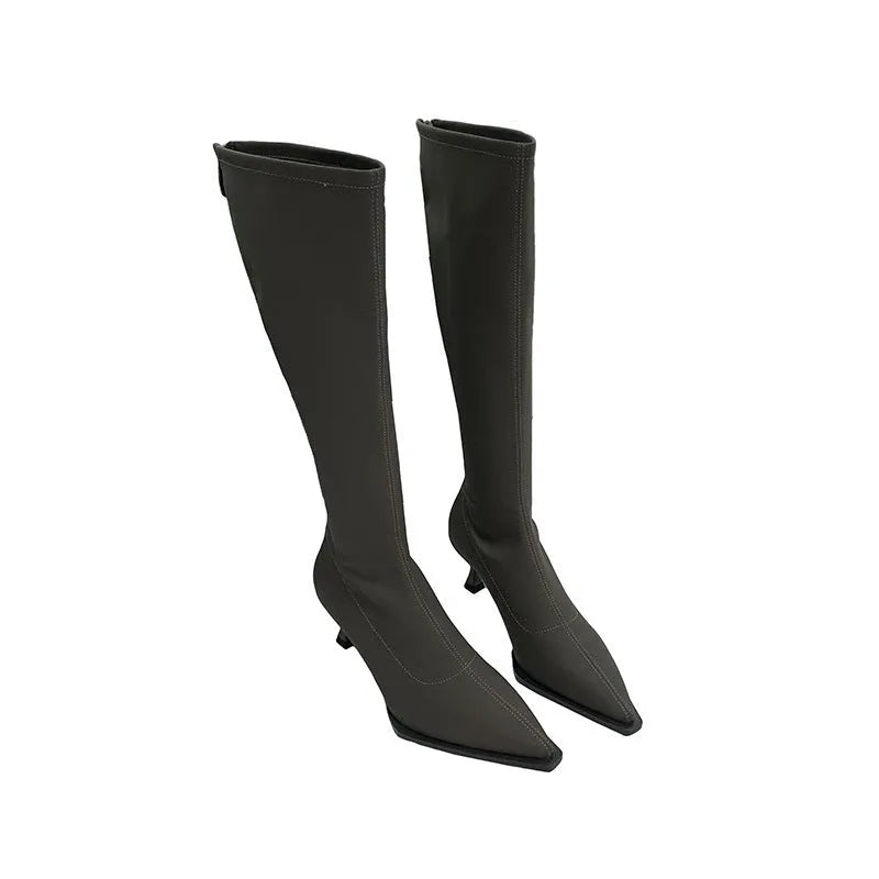 Black women's below knee pointed toe stiletto heel boots with a back zipper