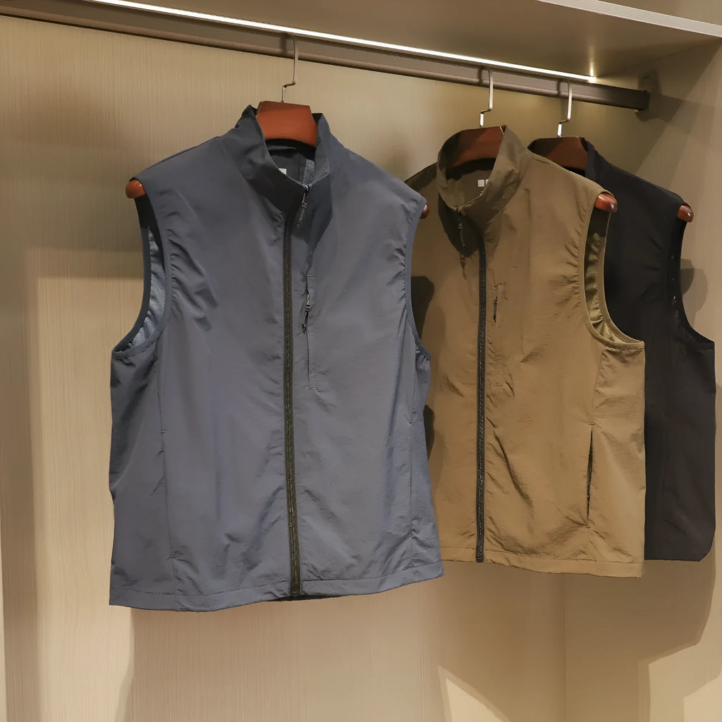 Men's straight-cut nylon vest in army green with side seam pockets and bandage-style detailing.