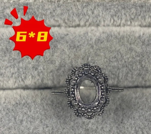 Oval denier ring with open mouth design, five-pointed star ornament, and 6*8mm stone