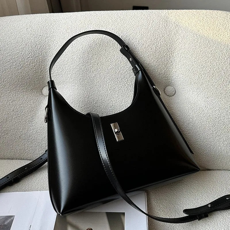 Genuine leather crossbody shoulder bag in dumpling shape with organised compartments