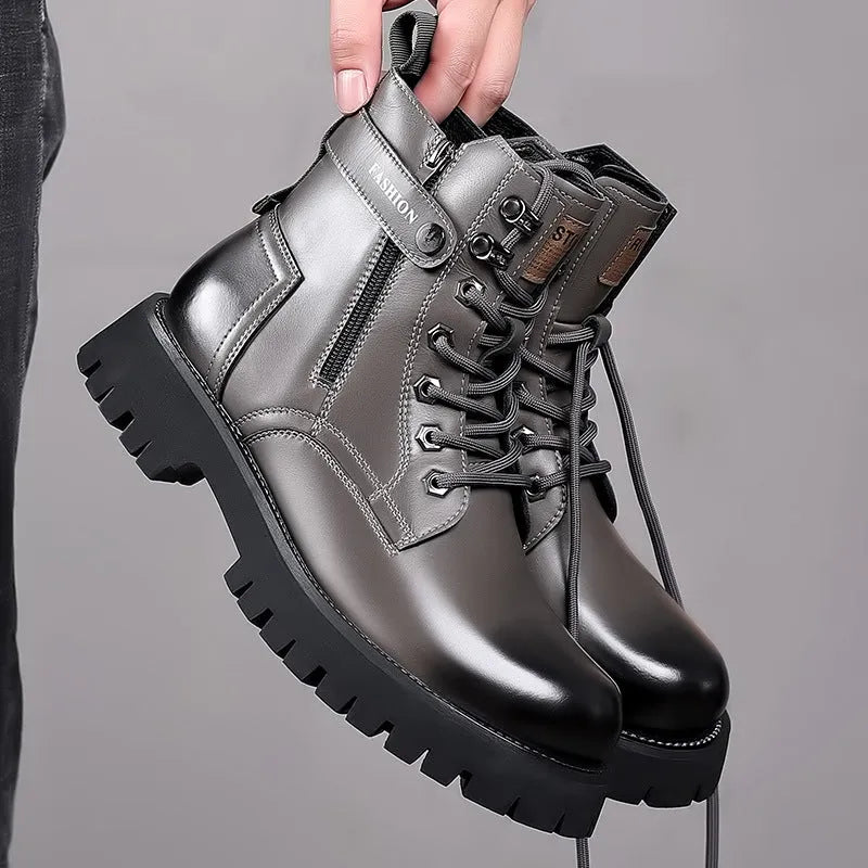 Men's light brown high-top martin boots with thick rubber sole and side zip on a grey background