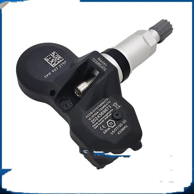 Black Audi tyre pressure monitor TPMS sensor replacement unit
