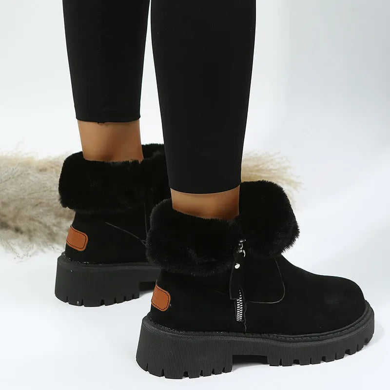 Women's black high-top plush snow boots with a side zipper and thick rubber sole