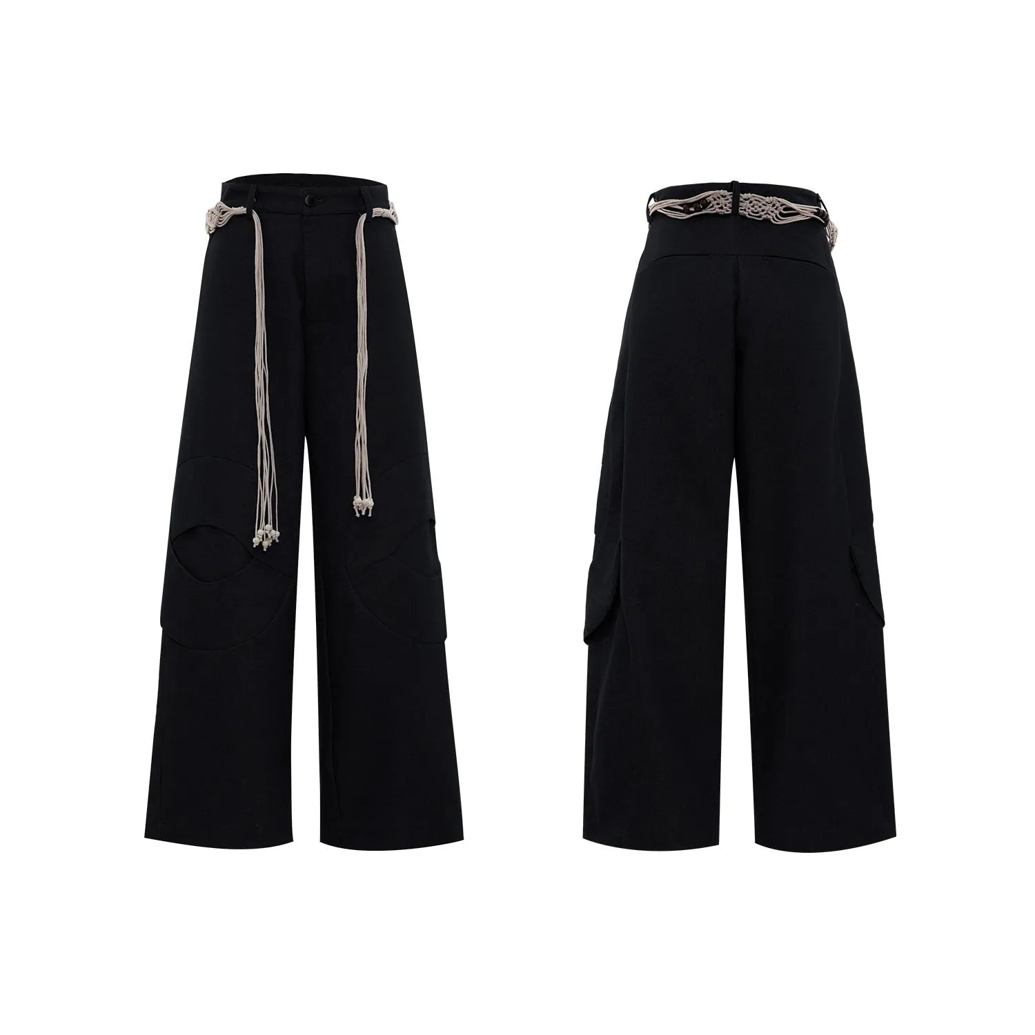 Man wearing dark grey straight-leg cotton trousers with a tassel detail and loose fit.