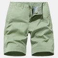 Man wearing blue printed denim casual shorts with an elastic waist and loose straight-leg fit