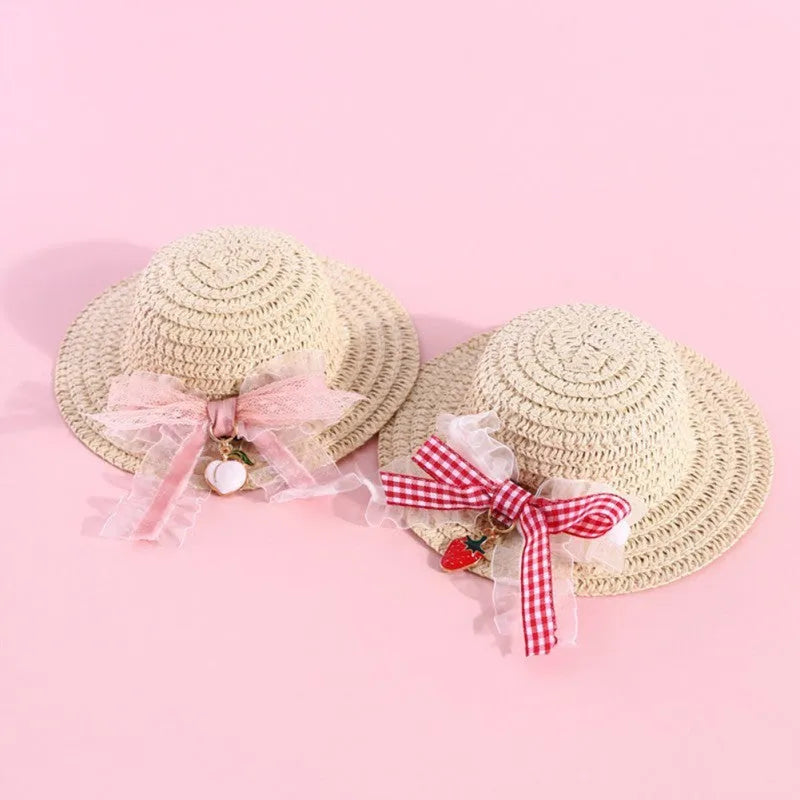 A colourful, handmade paper hat with a bowknot for a dog or cat on a white background.