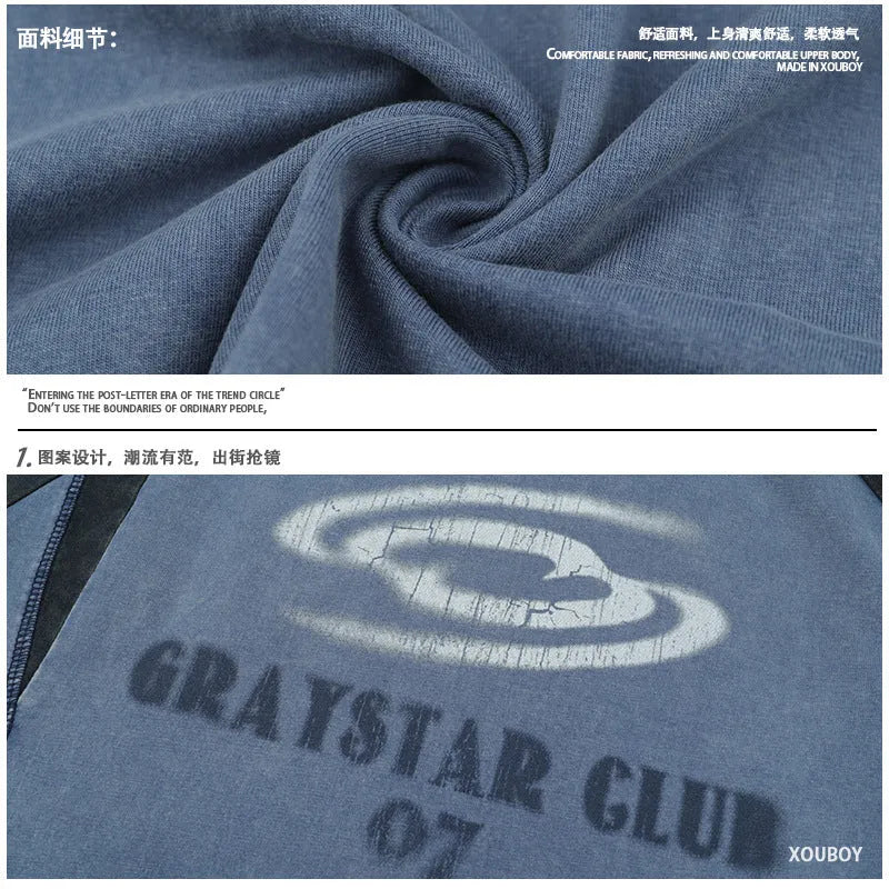 Blue men's t-shirt with printed letters and raglan sleeves on hanger