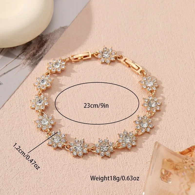 Flower-shaped zinc alloy bracelet with electroplated finish and coloured gem accents