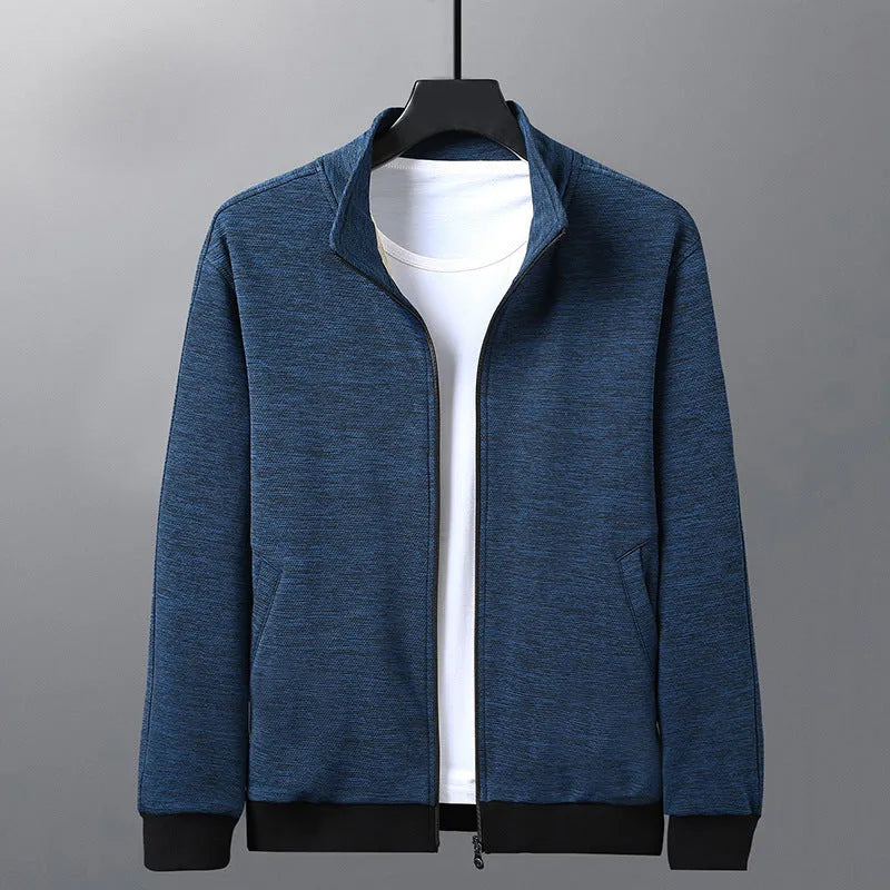 Men's black athletic fit casual jacket with a stand-up collar and front zip closure on a hanger.