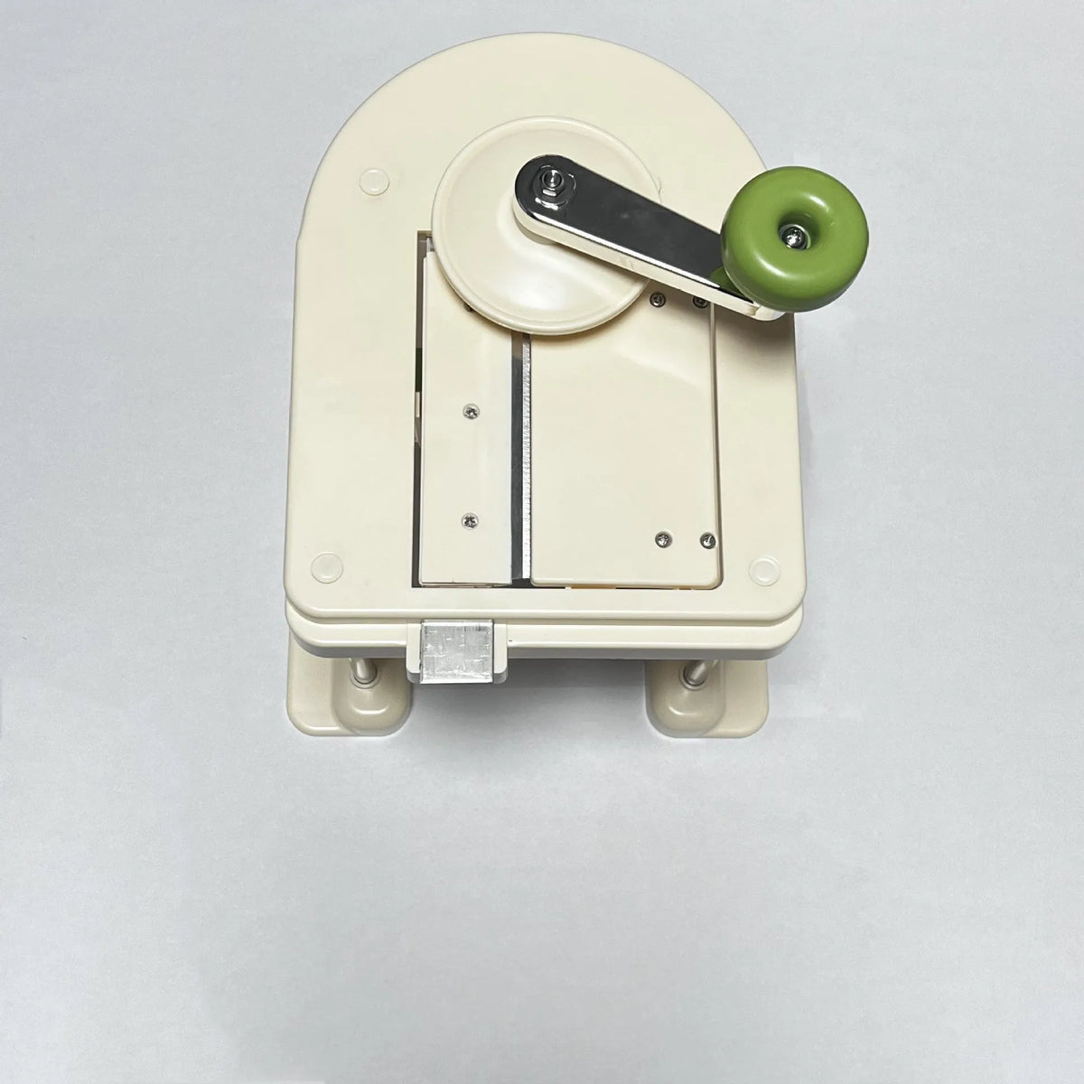 Beige stainless steel vegetable cutter grater slicer for kitchen use