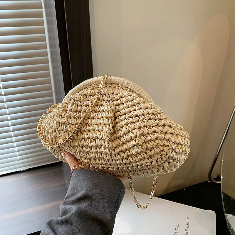 Women's straw beach shoulder bag with chain strap in shell shape