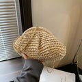 Women's straw beach shoulder bag with chain strap in shell shape