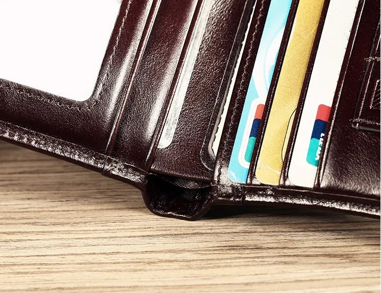 Men's leather wallet in black or brown showing internal compartments for cards, photos, banknotes, coins and documents