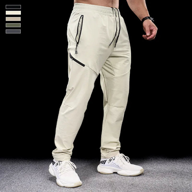 Men's waterproof quick-dry nylon workout trousers in multiple colours on a size chart.
