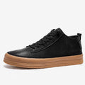 Men's black and white casual leather shoes with round toe and flat rubber sole