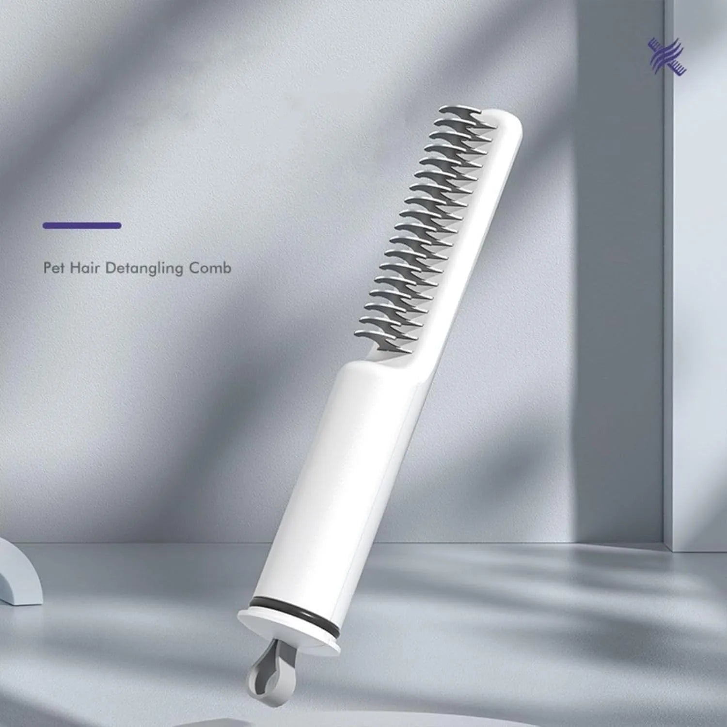 Stainless steel dematting comb for dogs with a user-friendly handle on a pink background.