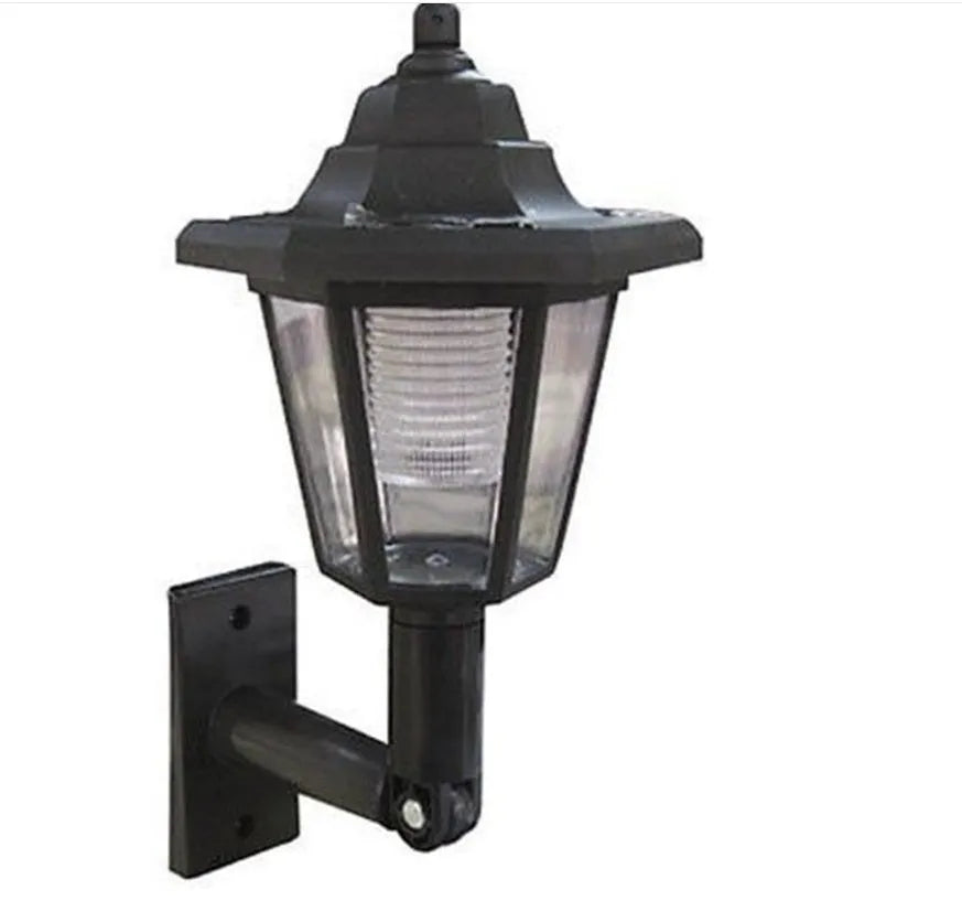 Black hexagonal solar wall lamp for outdoor garden or patio mounting