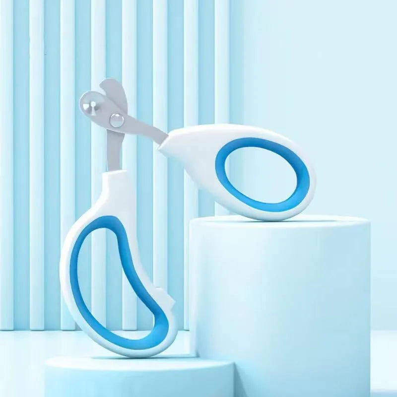 Blue cat nail clippers with circular hole design and cushioned non-slip handles.