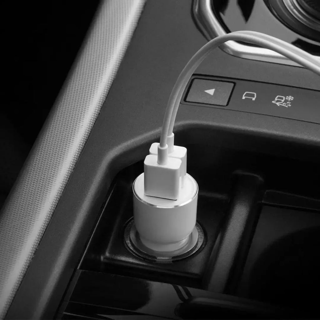 Black Ruimi 3S Bluetooth car charger with dual USB ports showing 26.5mm square dimensions