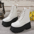 Women's mid-calf platform boots with chunky heel and side zipper in retro patchwork design.